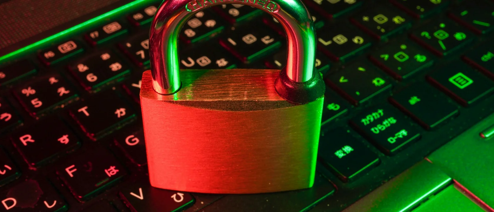 Padlock resting on a laptop keyboard