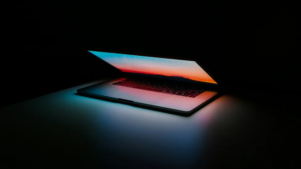 Developer laptop showing application code for an in-app AI workflow