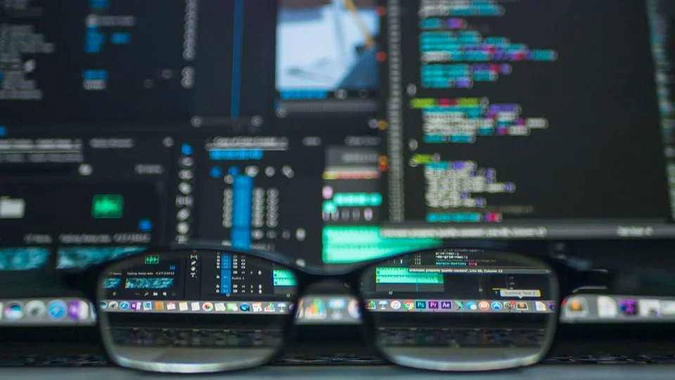Code and terminal on a laptop used while reviewing site performance