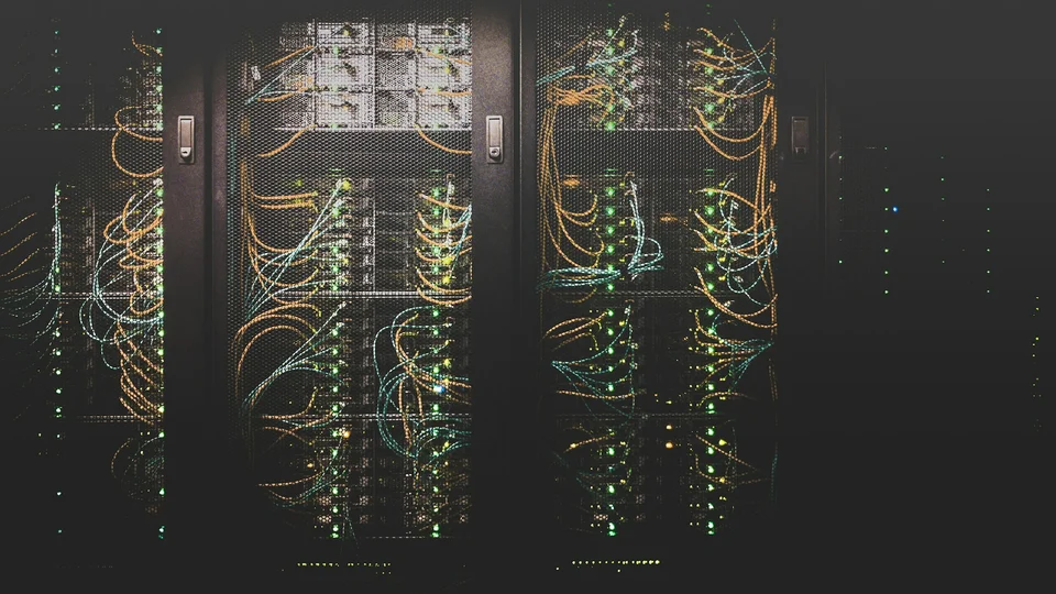 Server racks with network cables in a data room