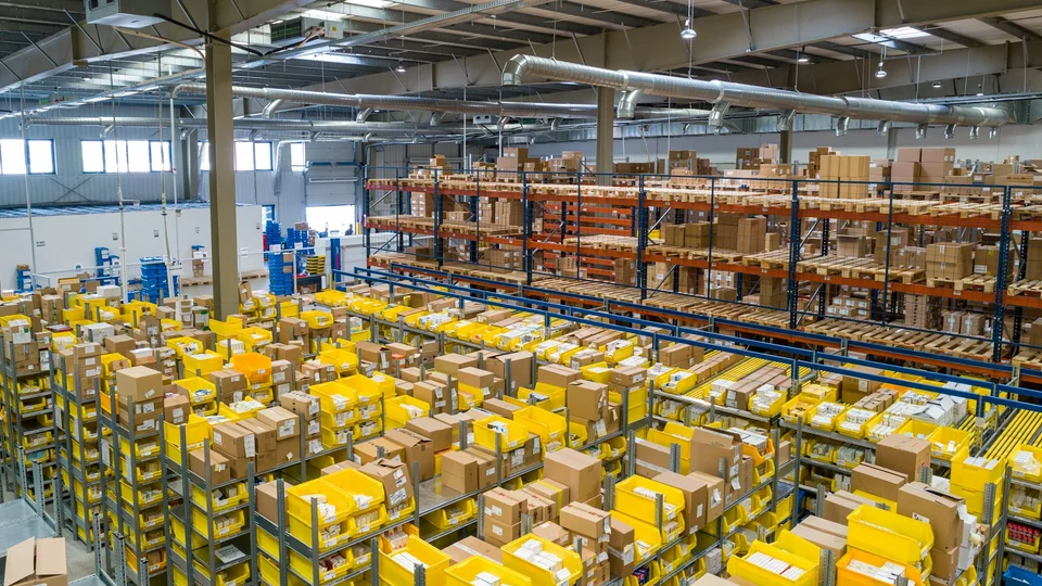 Warehouse aisles of packed orders waiting to move