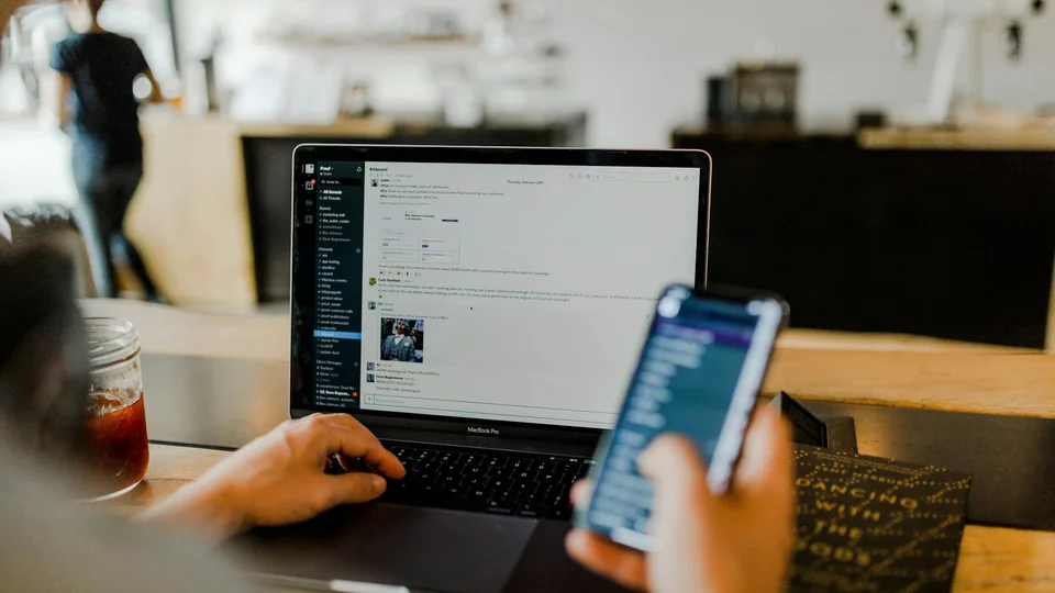 Website analytics and search console metrics on office monitor